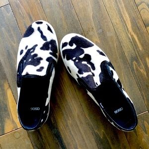 Animal print faux hide slip ons